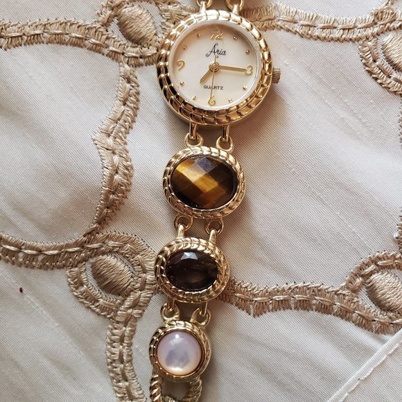 Aria Goldtone bracelet watch with tiger eye, smoky quartz and milky quartz gems - Picture 6 of 8